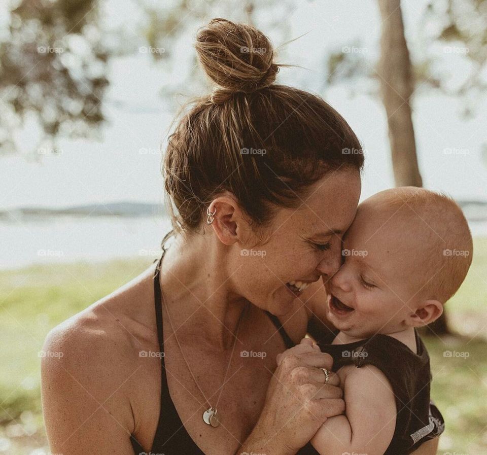 Mother and son smiling