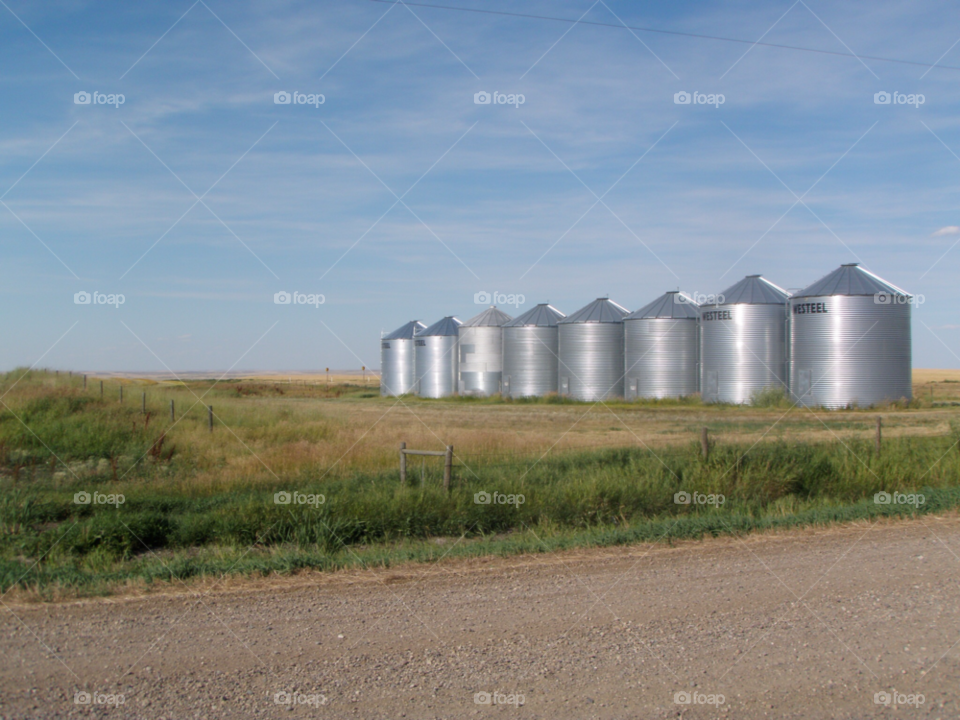 field farm silo flat land by lagacephotos