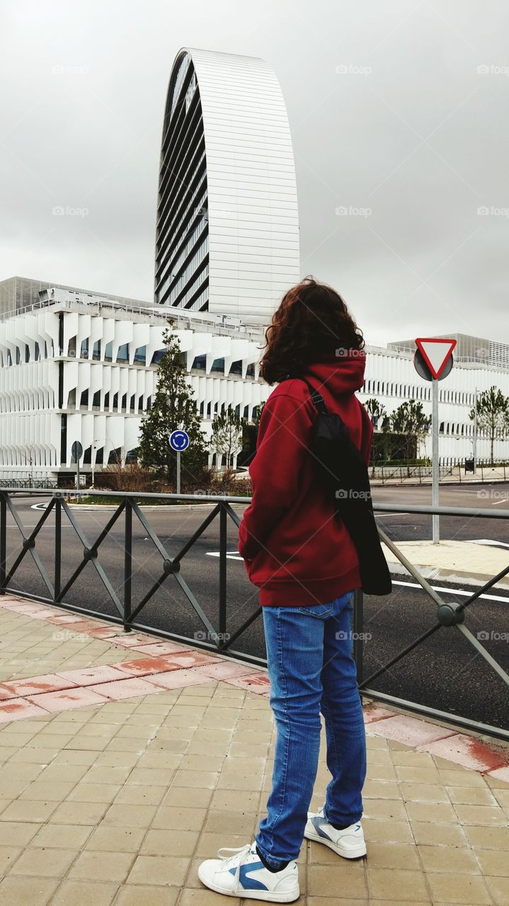 Girl exploring modern architecture
