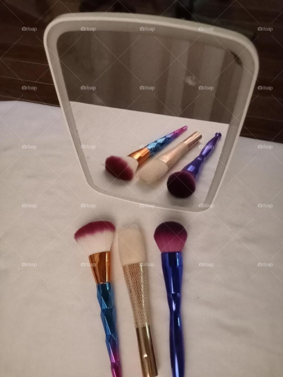 In the mirror image is a reflected duplication of an object that appears almost identical but the direction is reversed.