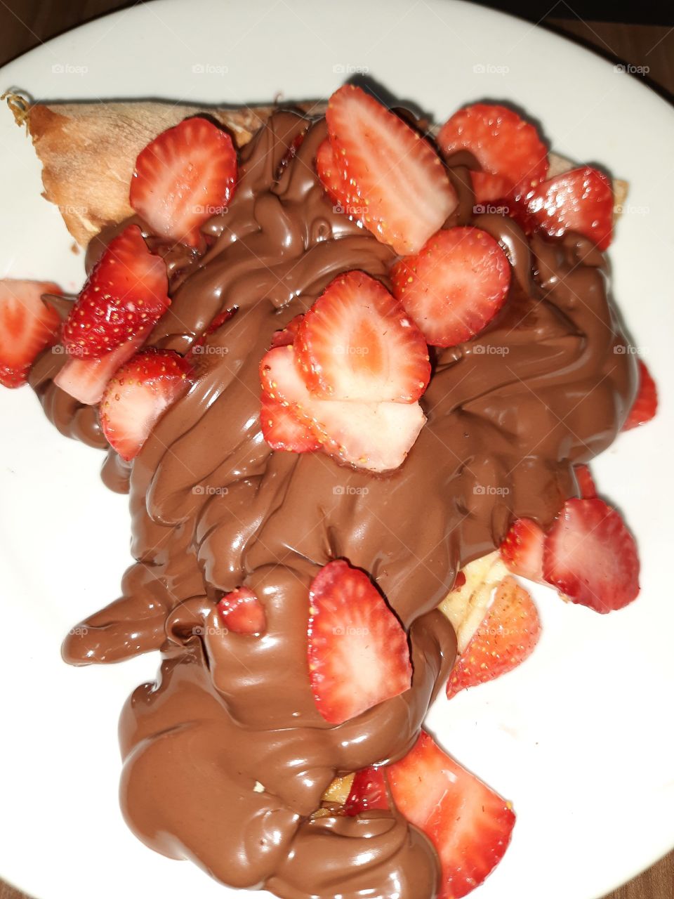 delicious chocolate pizza with strawberries