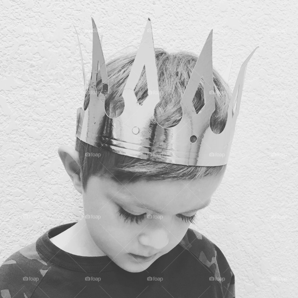 Boy wearing crown