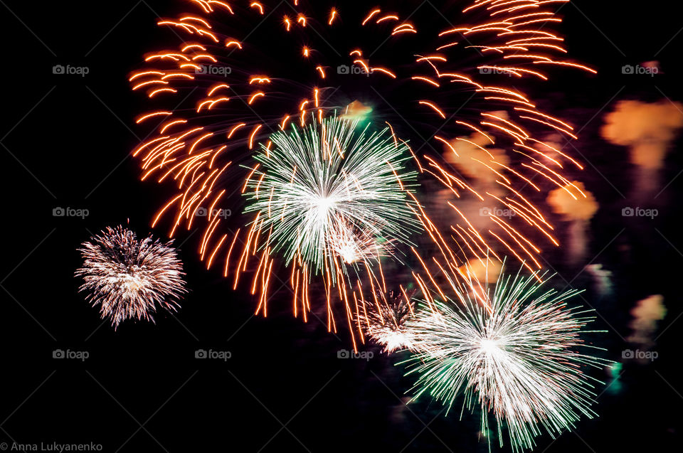 Close-up of fireworks against sky at night