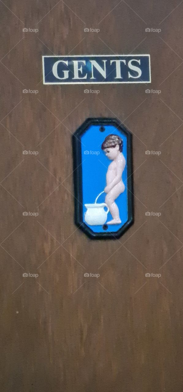 Toilet door sign indicating the boys or gentlemen's Toilet