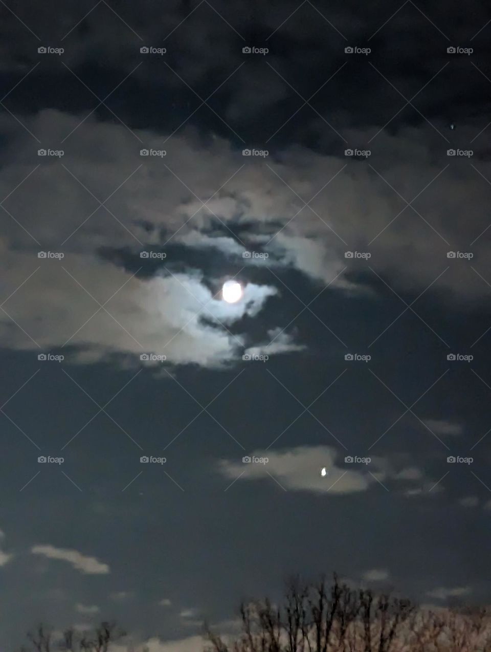 nightcloud surrounding the moon