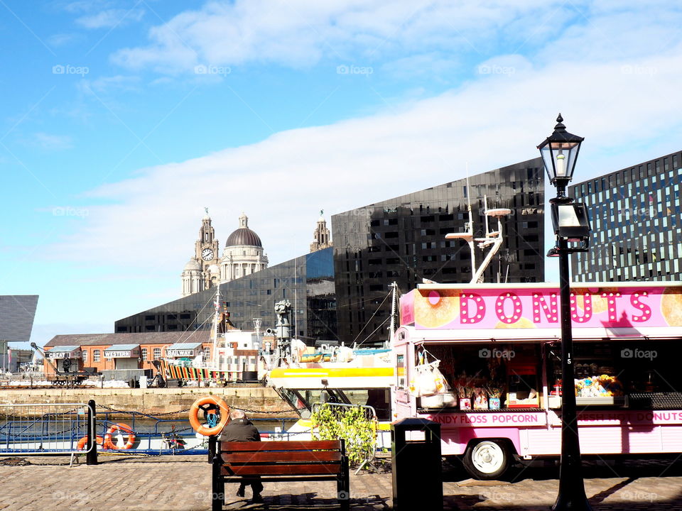 Donut Truck in Liverpool, England on the coast with colorful, delicious desserts.