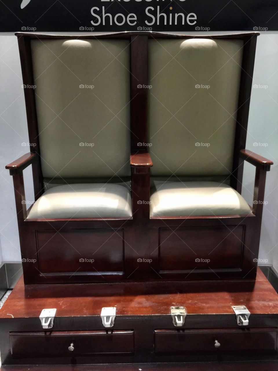 Shoe polishing. Empty shoe polishing chairs, Miami Airport, Florida 