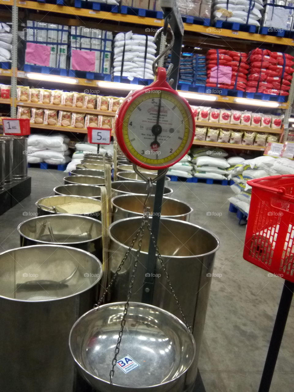 A scale in a shopping mall for weight in India.