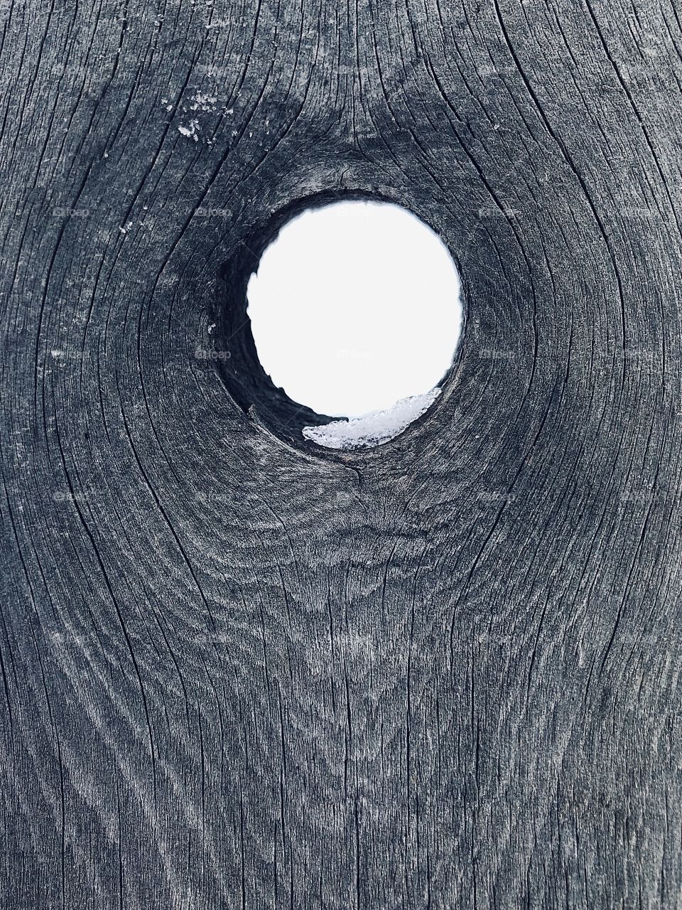 Hole in a wooden board