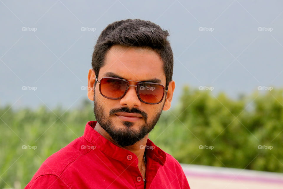 man with red sunglasses