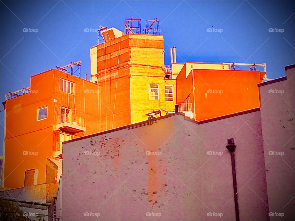 Cityscape from Long Island City, Queens, New York during the “Golden Hour” of the sunset. This picture was taken in the Spring of 2019. Hypnotic Productions