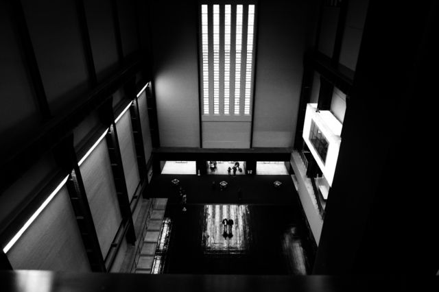 B&W Entry ... photo showing light coming from a window and lighting up the floor 