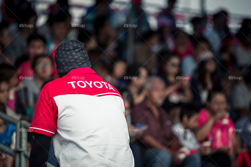 Toyota racing team on the audiences stadium 