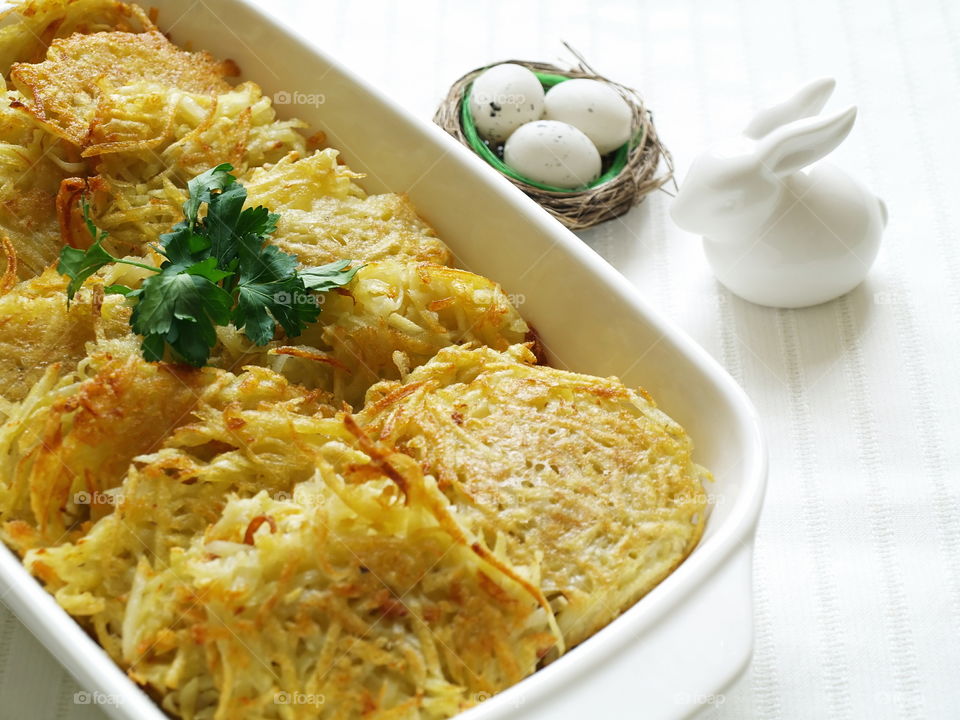 Potato pancakes. Potato pancakes on white plate