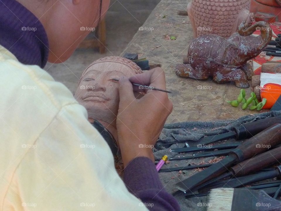 A Buddha sculpture from wood in Cambodia