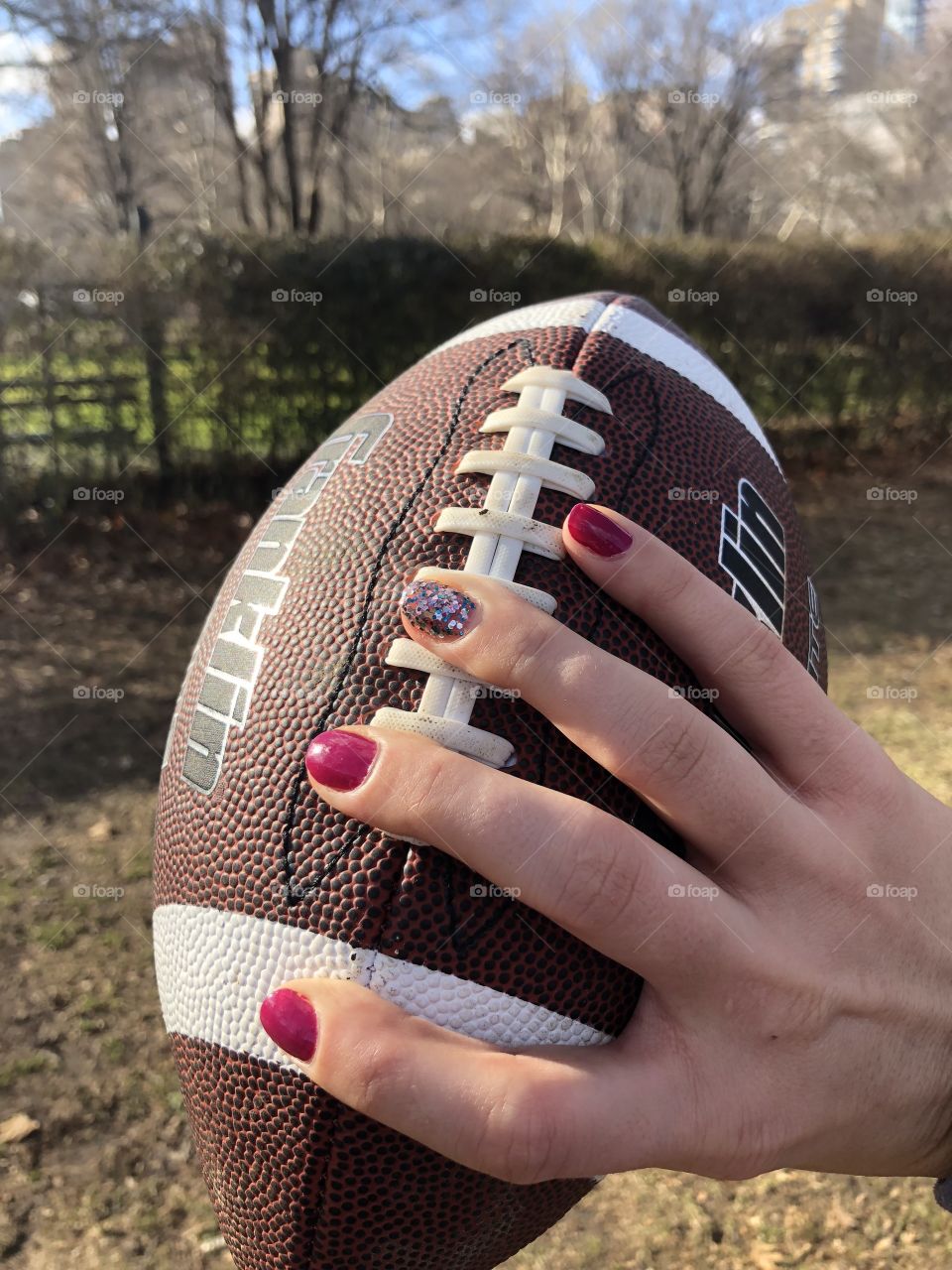 Football with sparkle nails