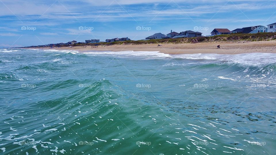 surfing the waves in the outer banks with my drone- taken by aerial pointe drone 