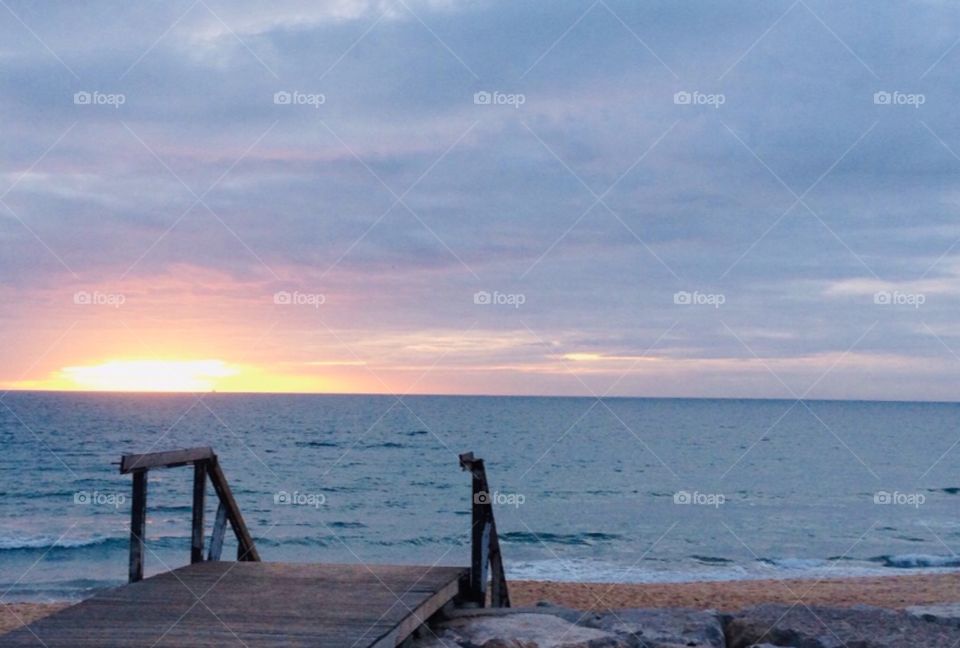 Sunset on the beautiful blue sea 