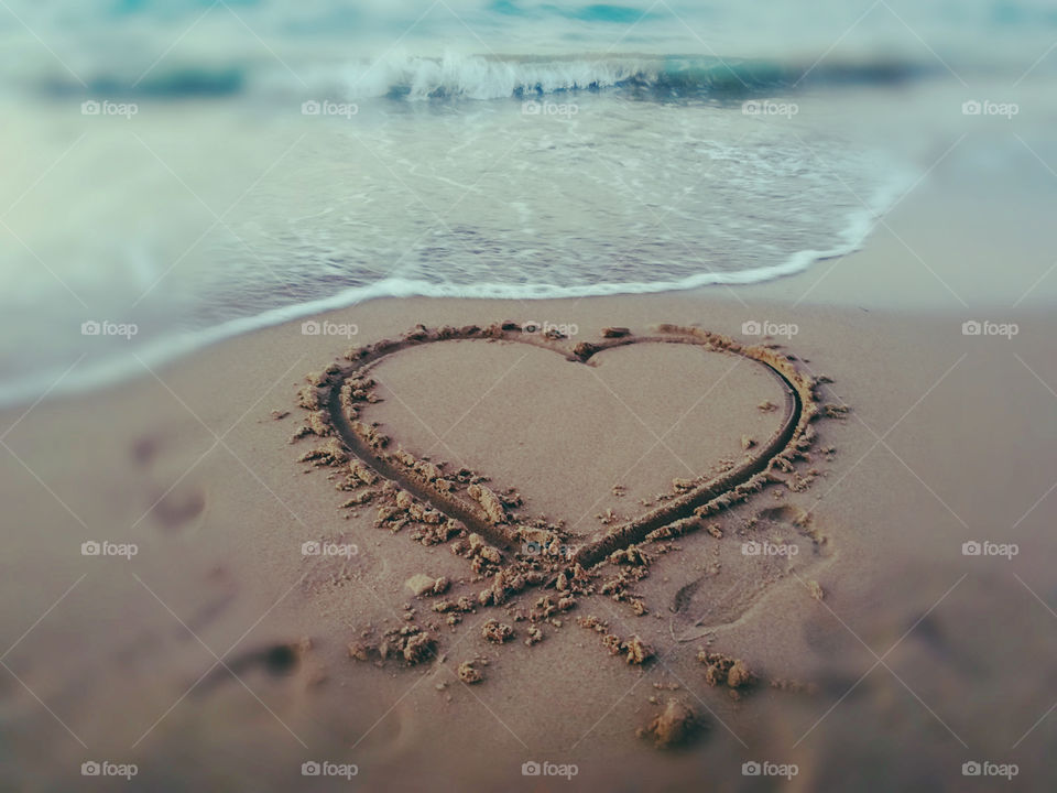 Heart drawn on the sand