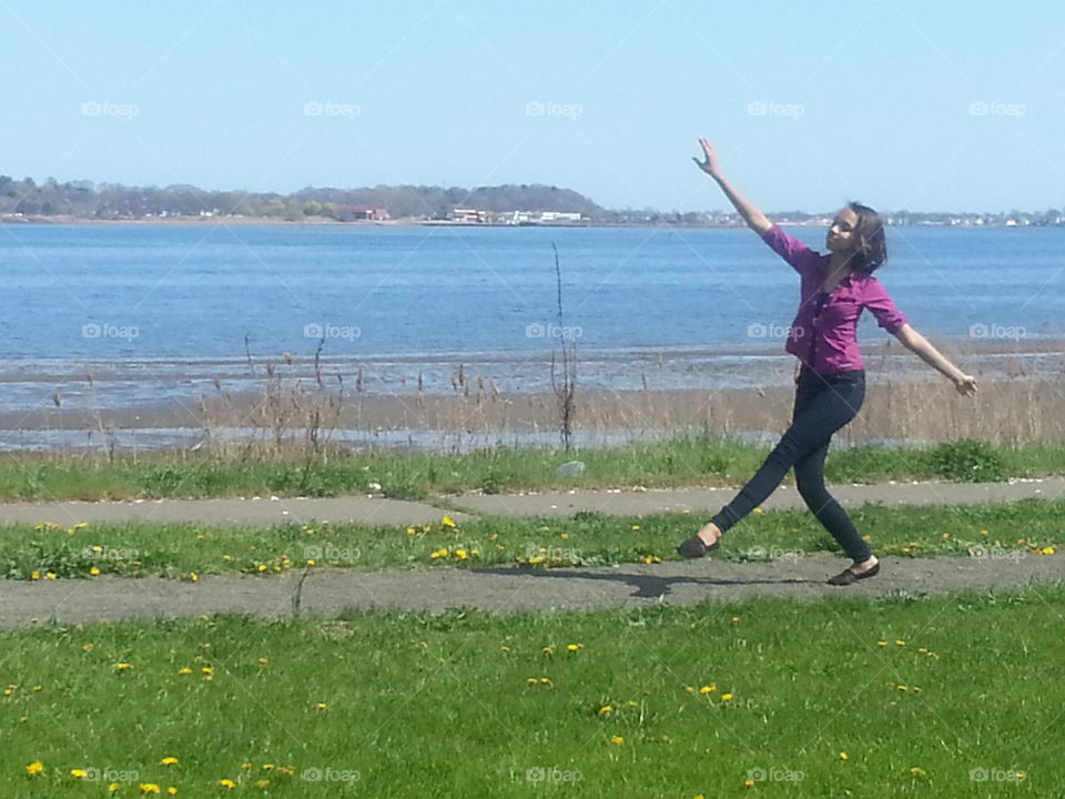 Dancing in the Sun. my daughter dancing by the shore