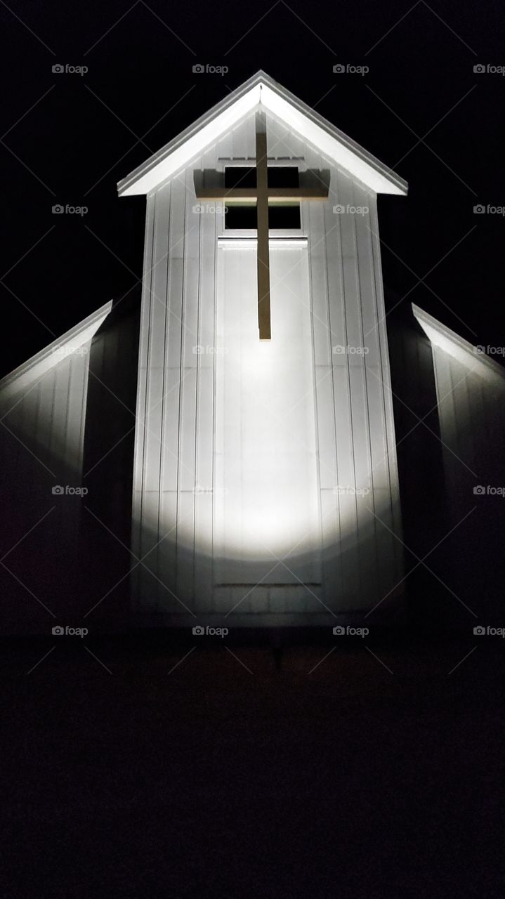 lit up cross.