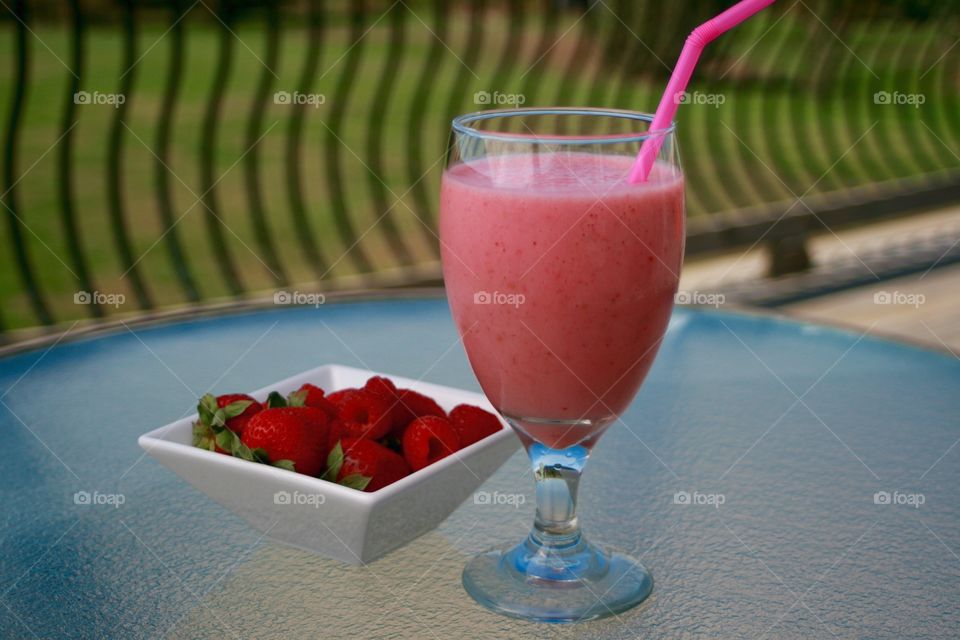 Berry Pink. Strawberry and Raspberry Smoothie and Fruit