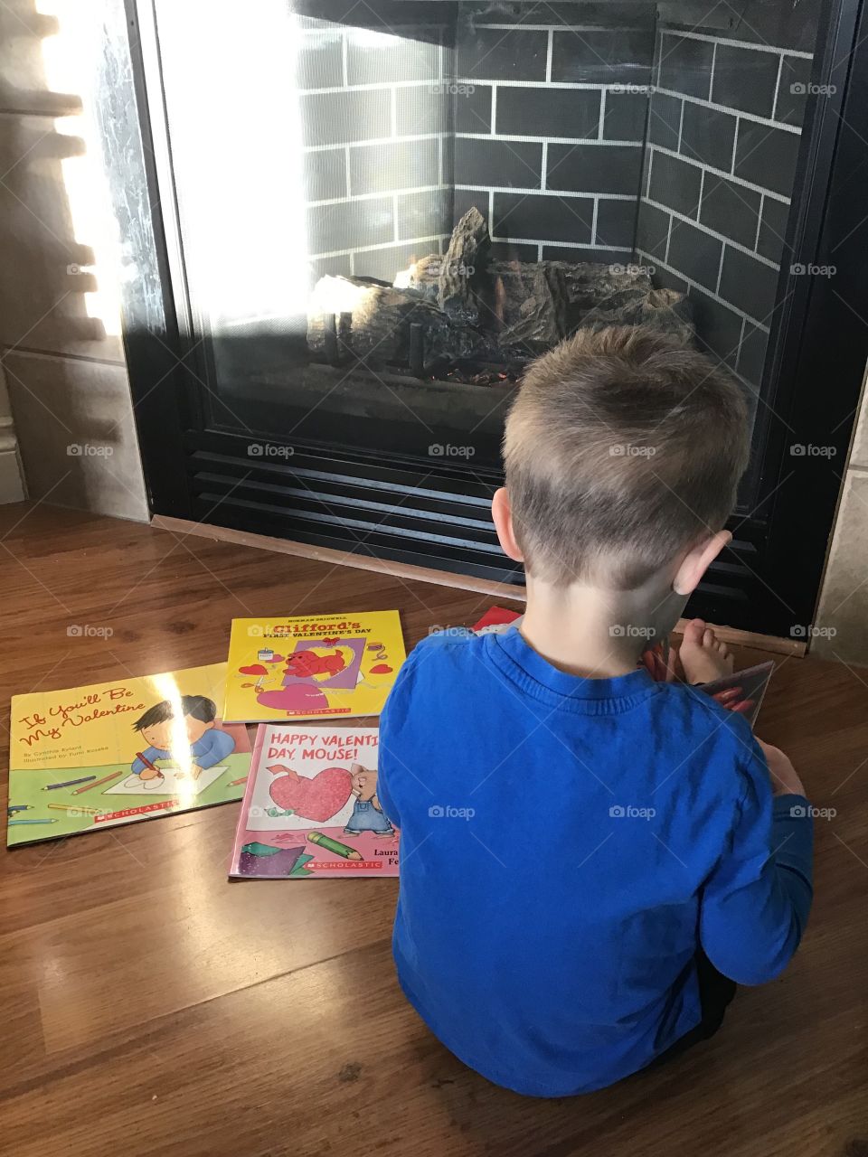 Reading by the fireplace 