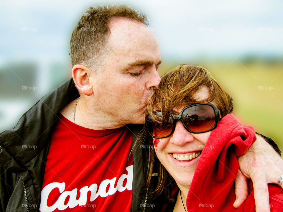 Selfie time! Selfie of my husband & I celebrating on a windy Canada Day, July 1. I’m always bugging him to smile for the camera but this was way sweeter! Great day! 🇨🇦