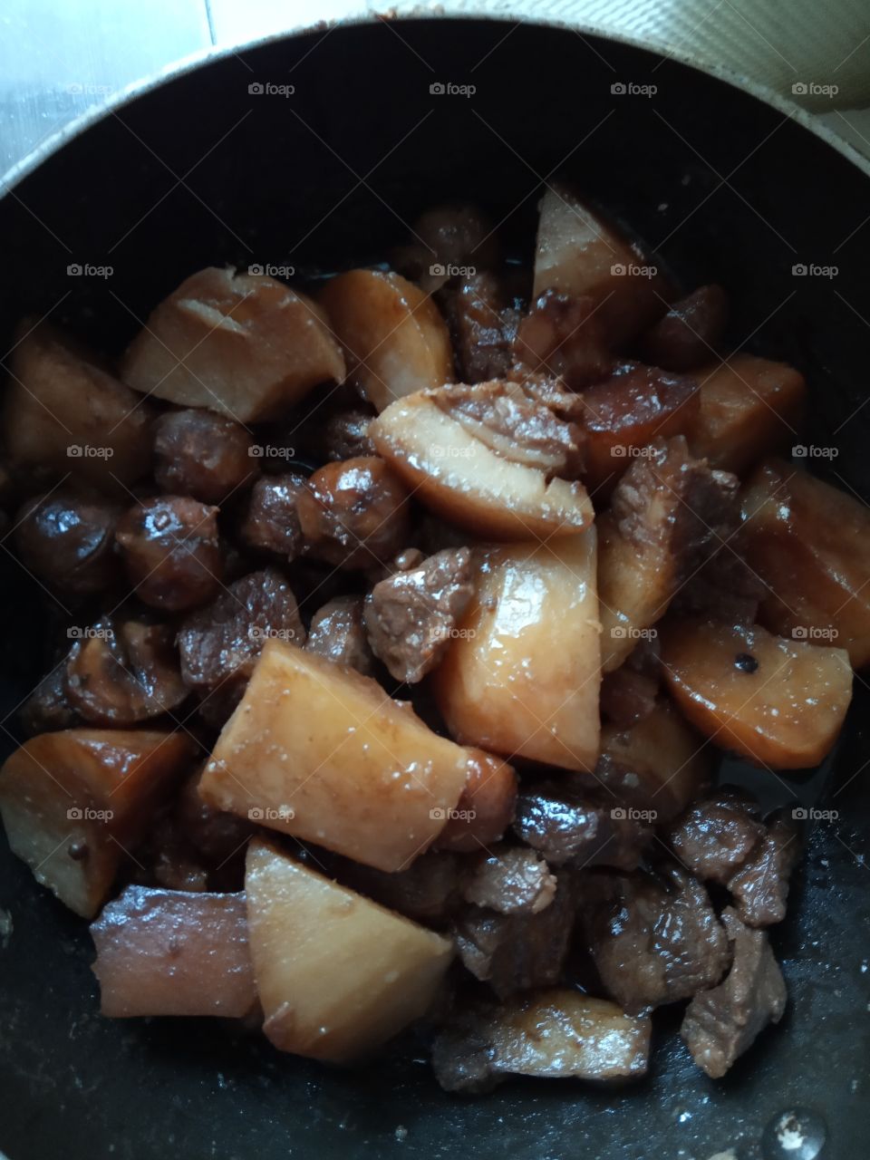 braised pork with potato and hazel nuts