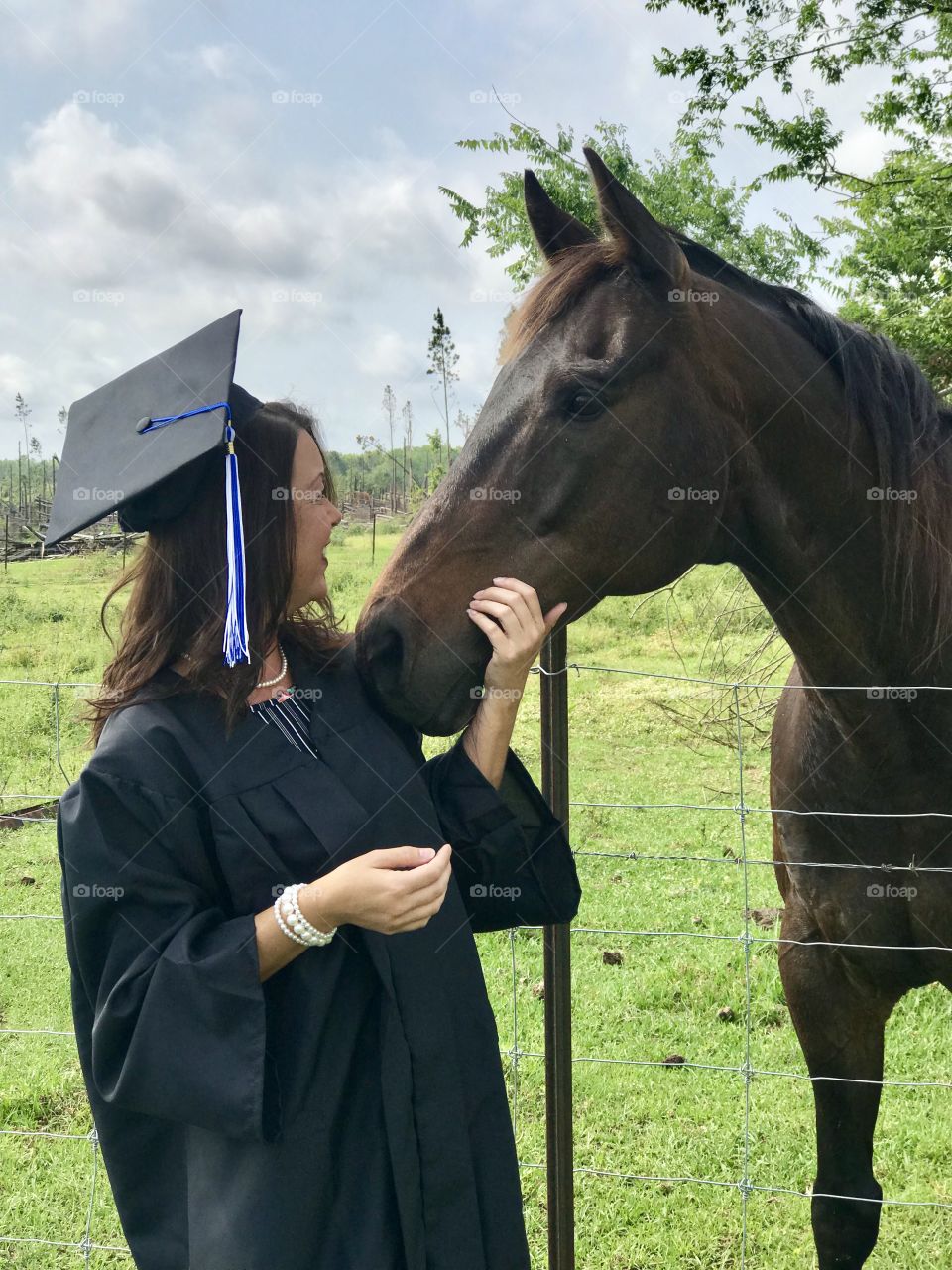 Graduation picture with a stallion 
