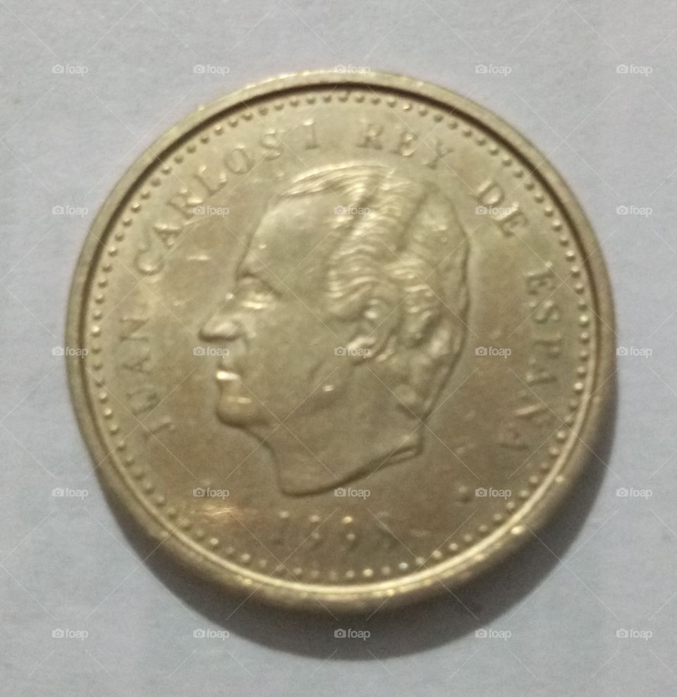 100 posetas coin back from Spain
