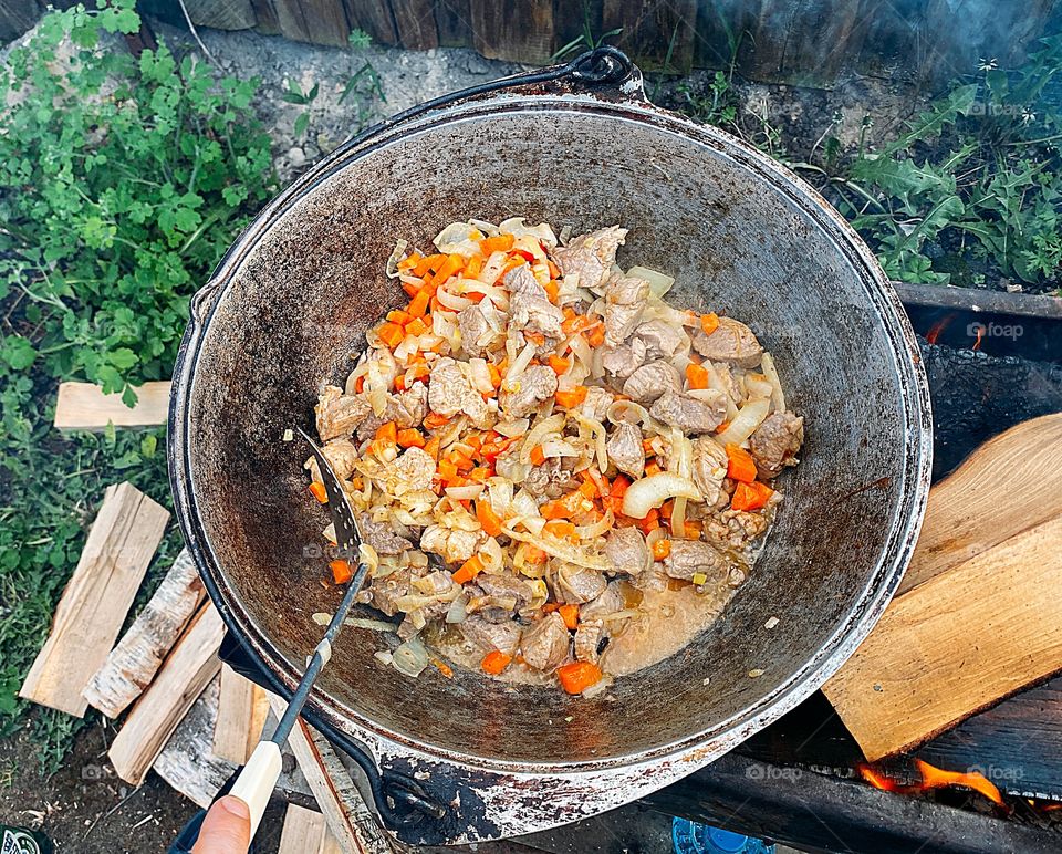 Cooking food on the campfire