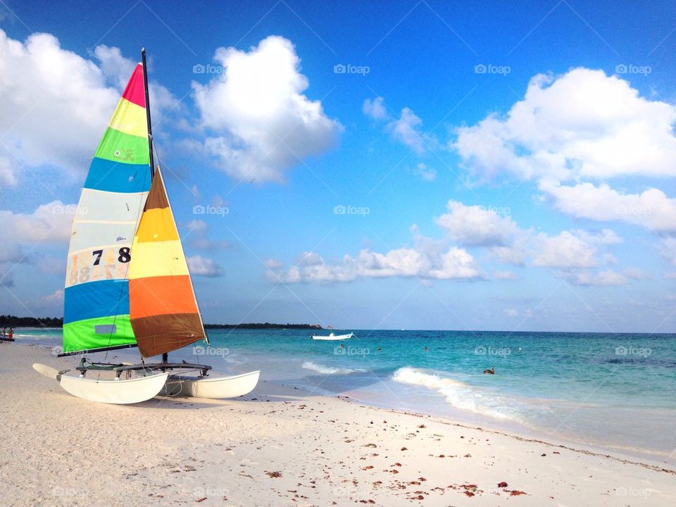Boat on a tropical summer beach 