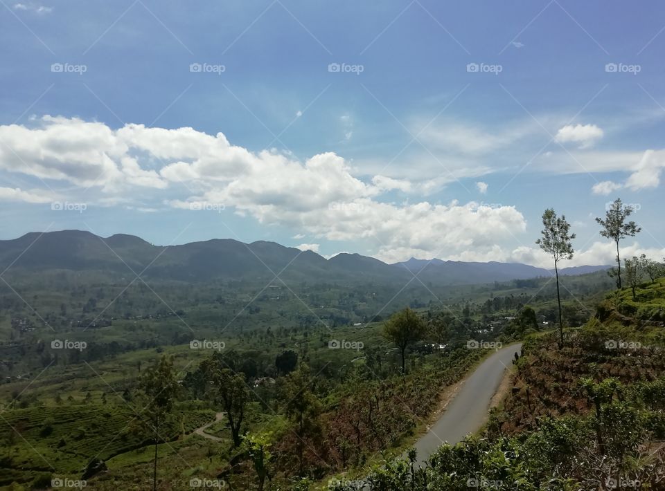 It's a very rare occasion I came across.. Clouds are like a train holding hands right on top of the mountains.. Its a pretty strait line 😉😎