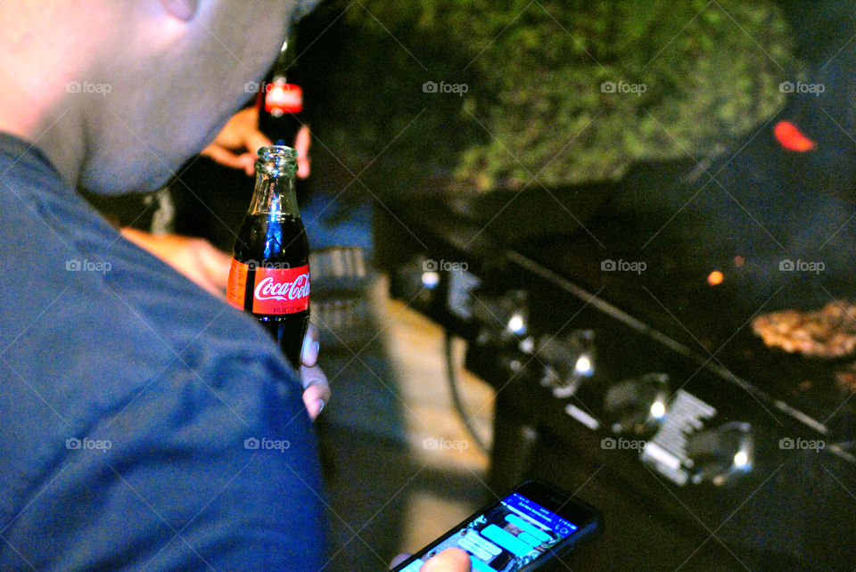 Coke moments with friends while grilling, bbq and Coca-Cola best spent with friends