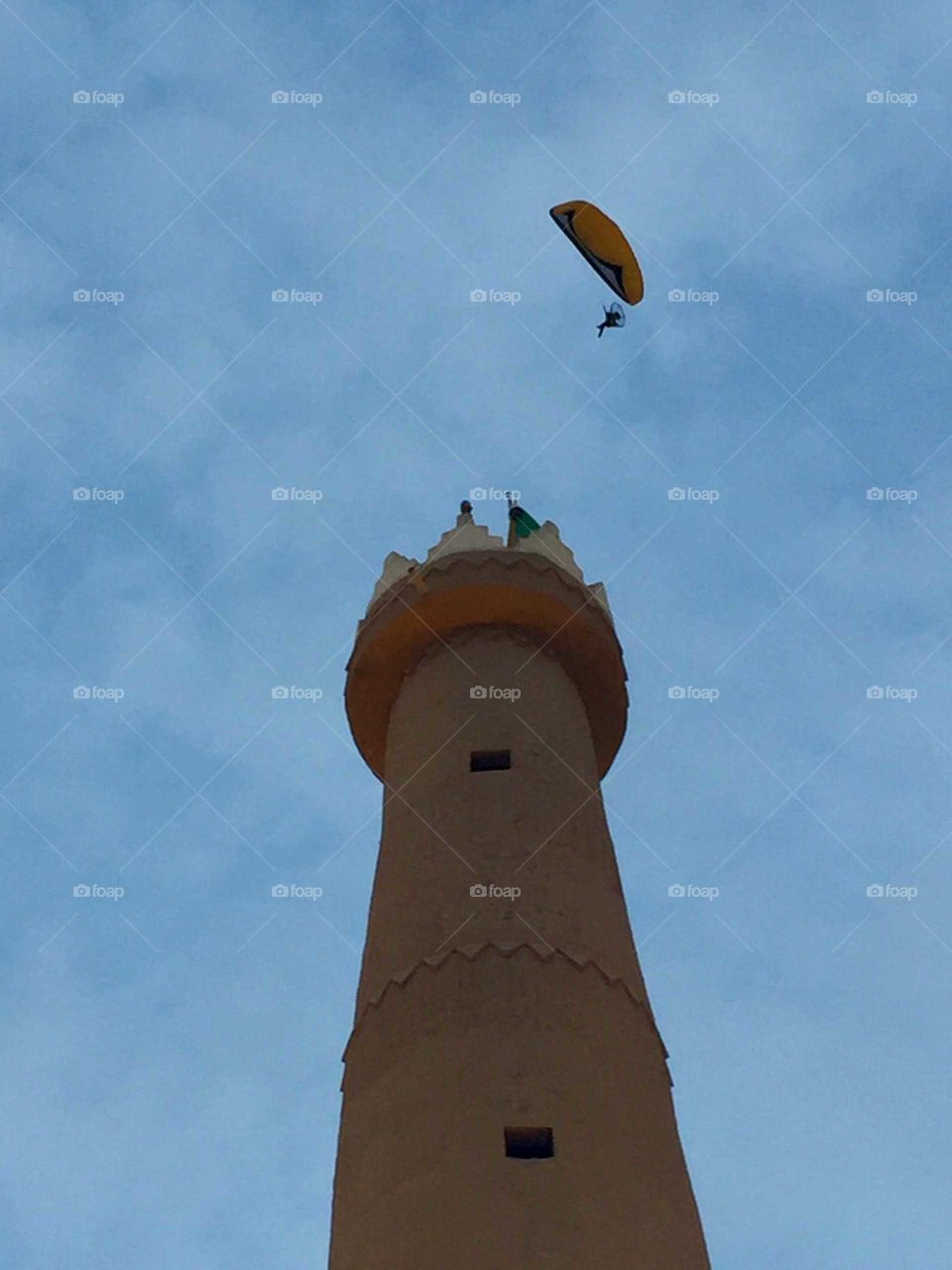 tower and paraglider