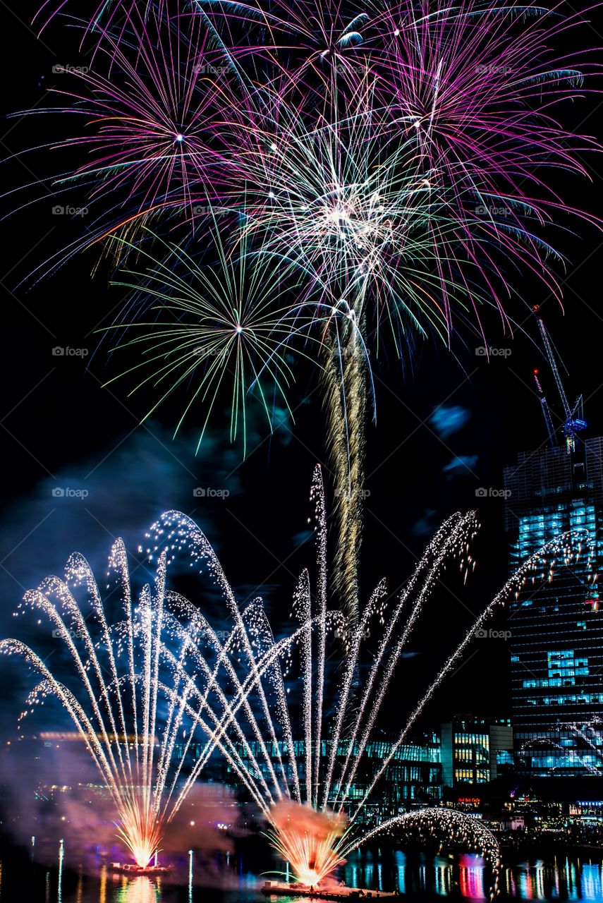 View of firework display at night