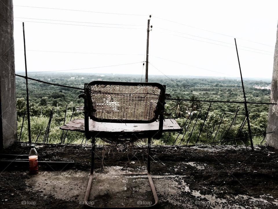 Beautiful valley-view with an old chair in front of it. (iPhone 6)