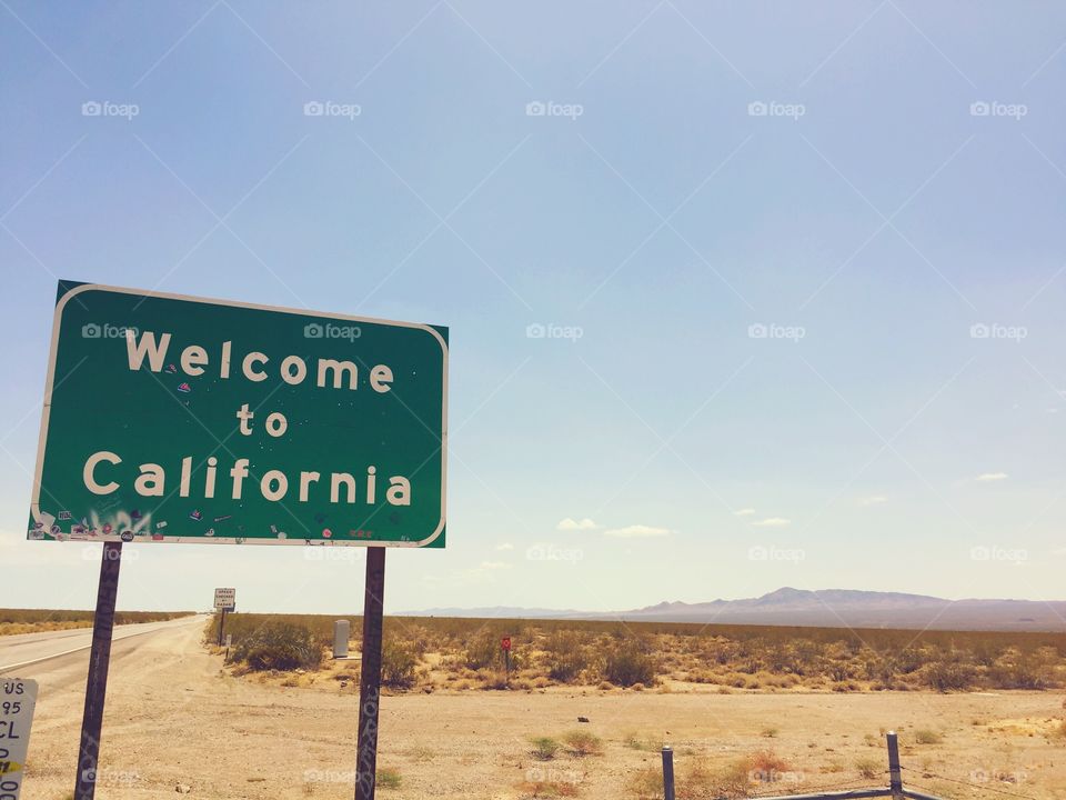Welcome to California signboard near highway
