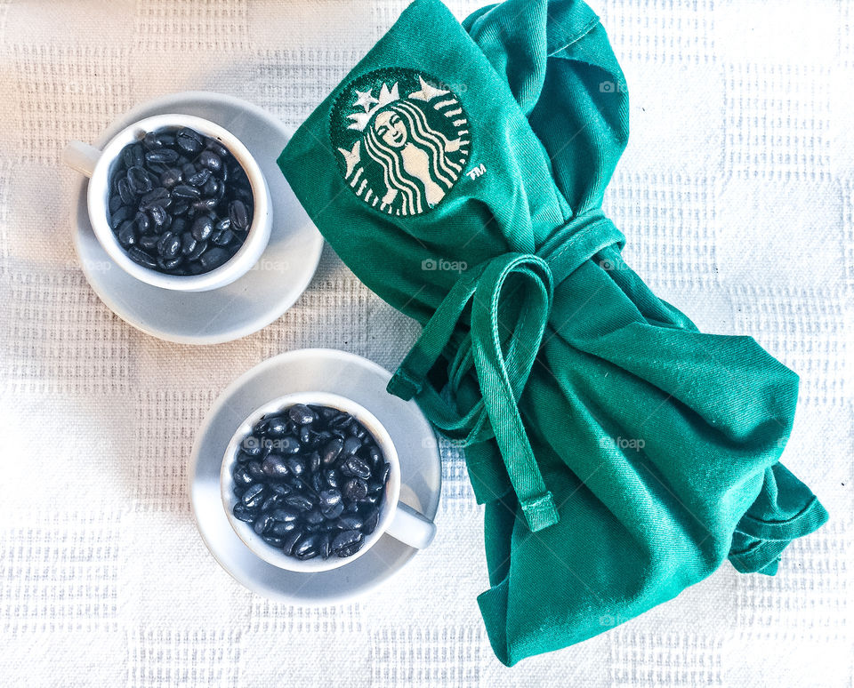 Creative starbucks coffee flat lay with espresso beans