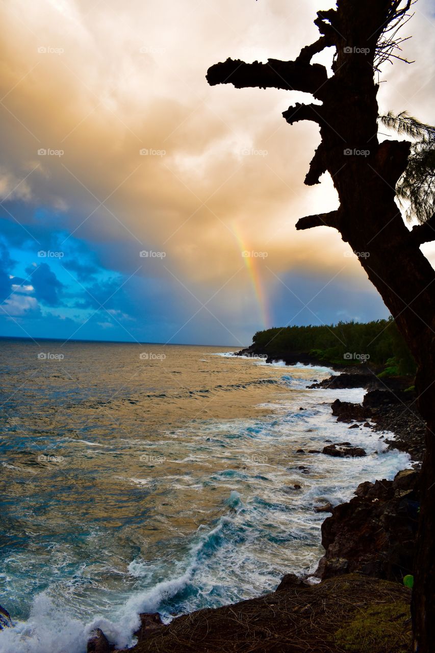 A rainbow at dusk on the island of Hawaii