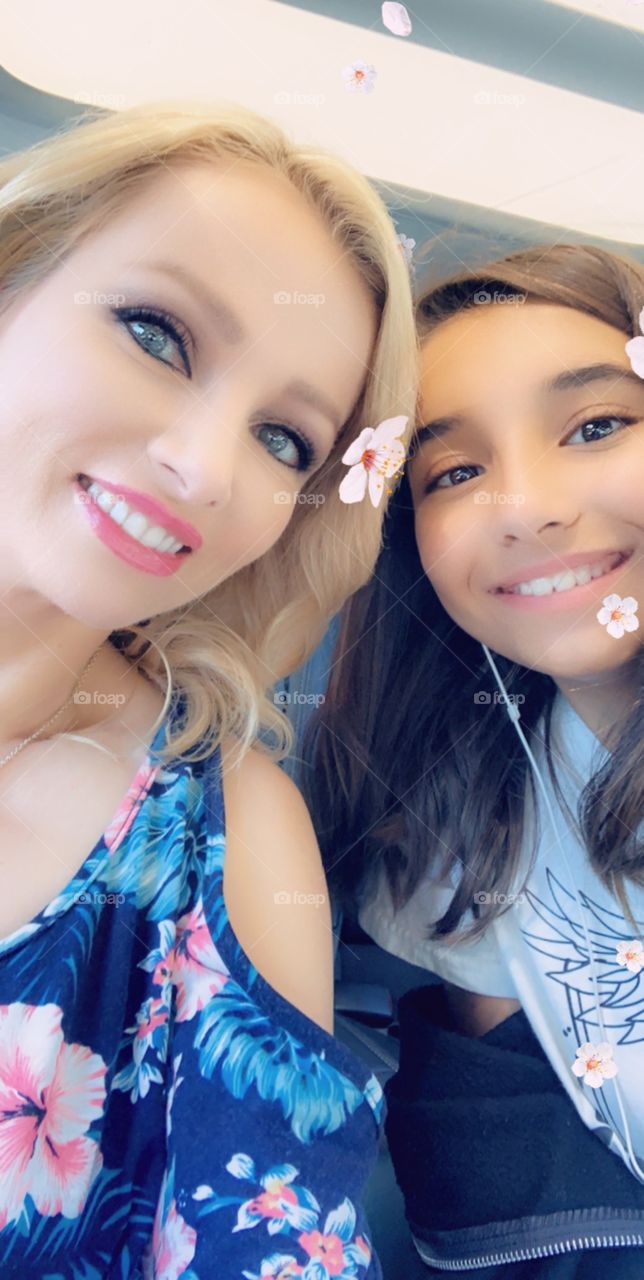 Mother & daughter playing on Snapchat 