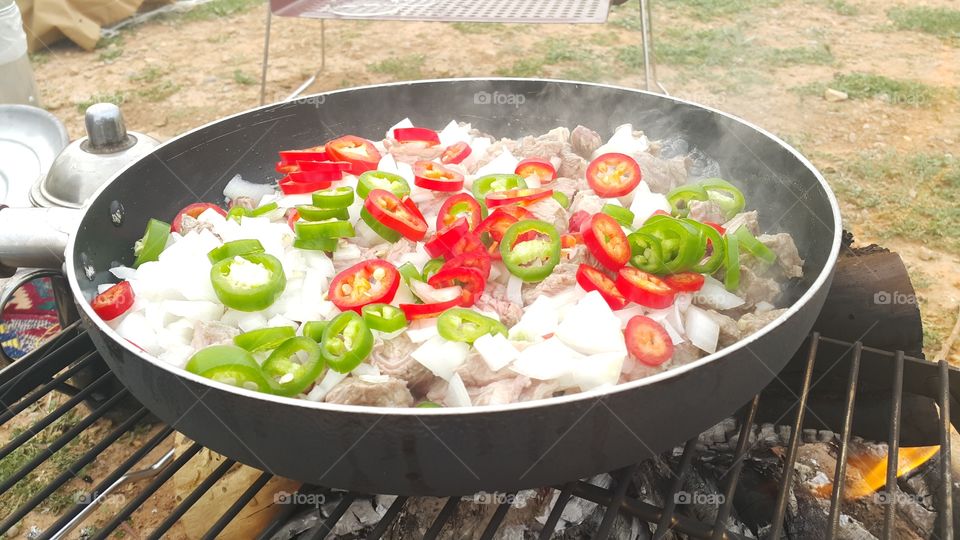 Vegetable cooking on grill barbecue