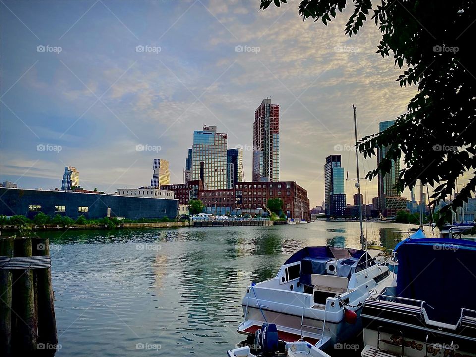 From even further away here it is once again, the “East River” at “Newtown Creek” by the “Pulaski Bridge” around evening time with the sun just setting behind the horizon. 2022. Hypnotic Productions