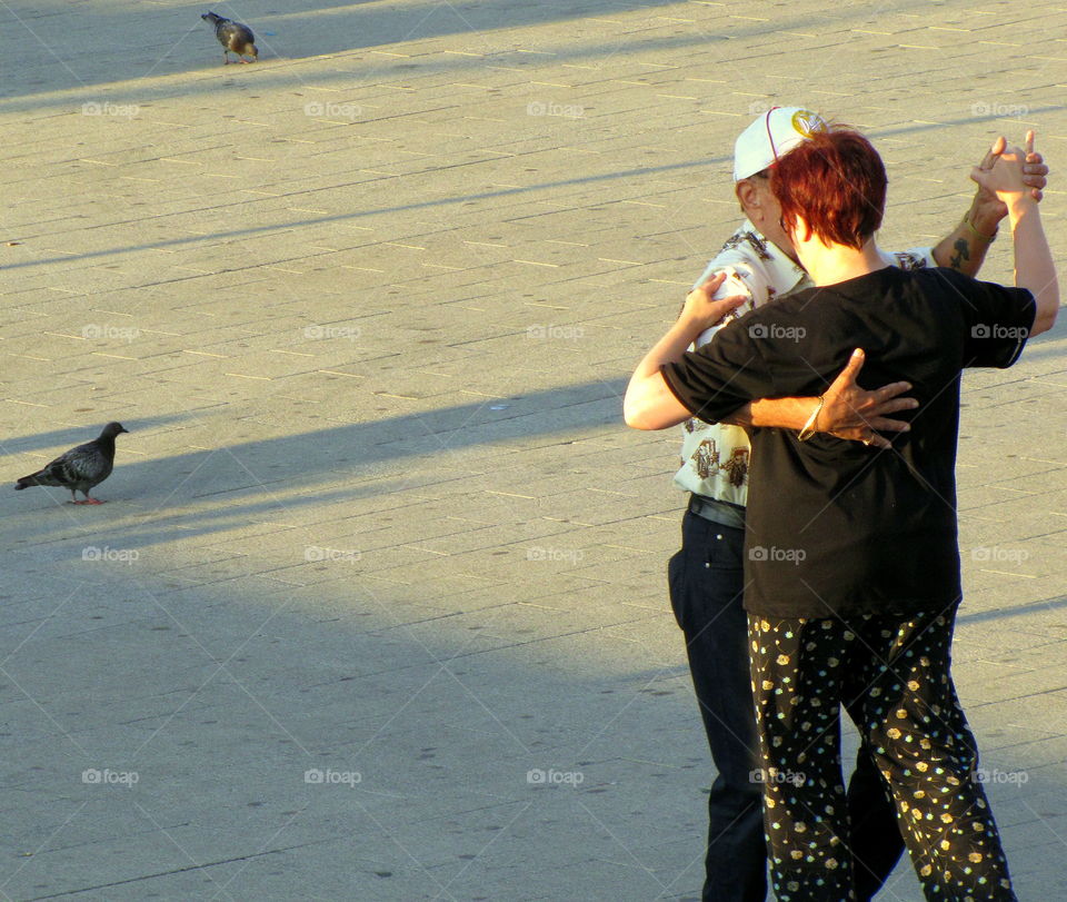 couple dancing in the street