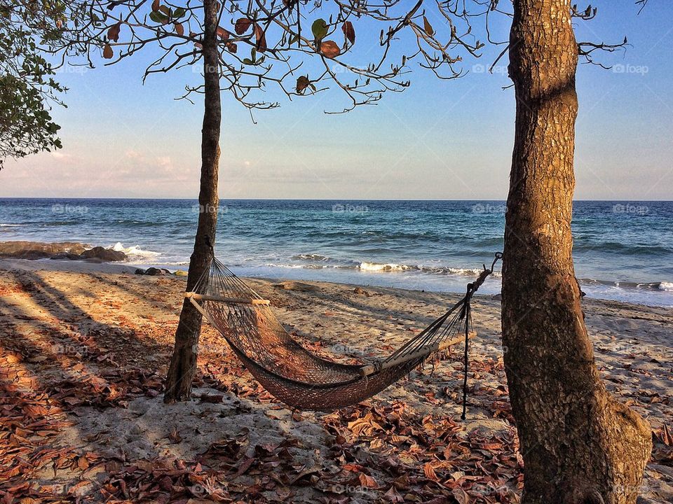 Hammock on an empty beach