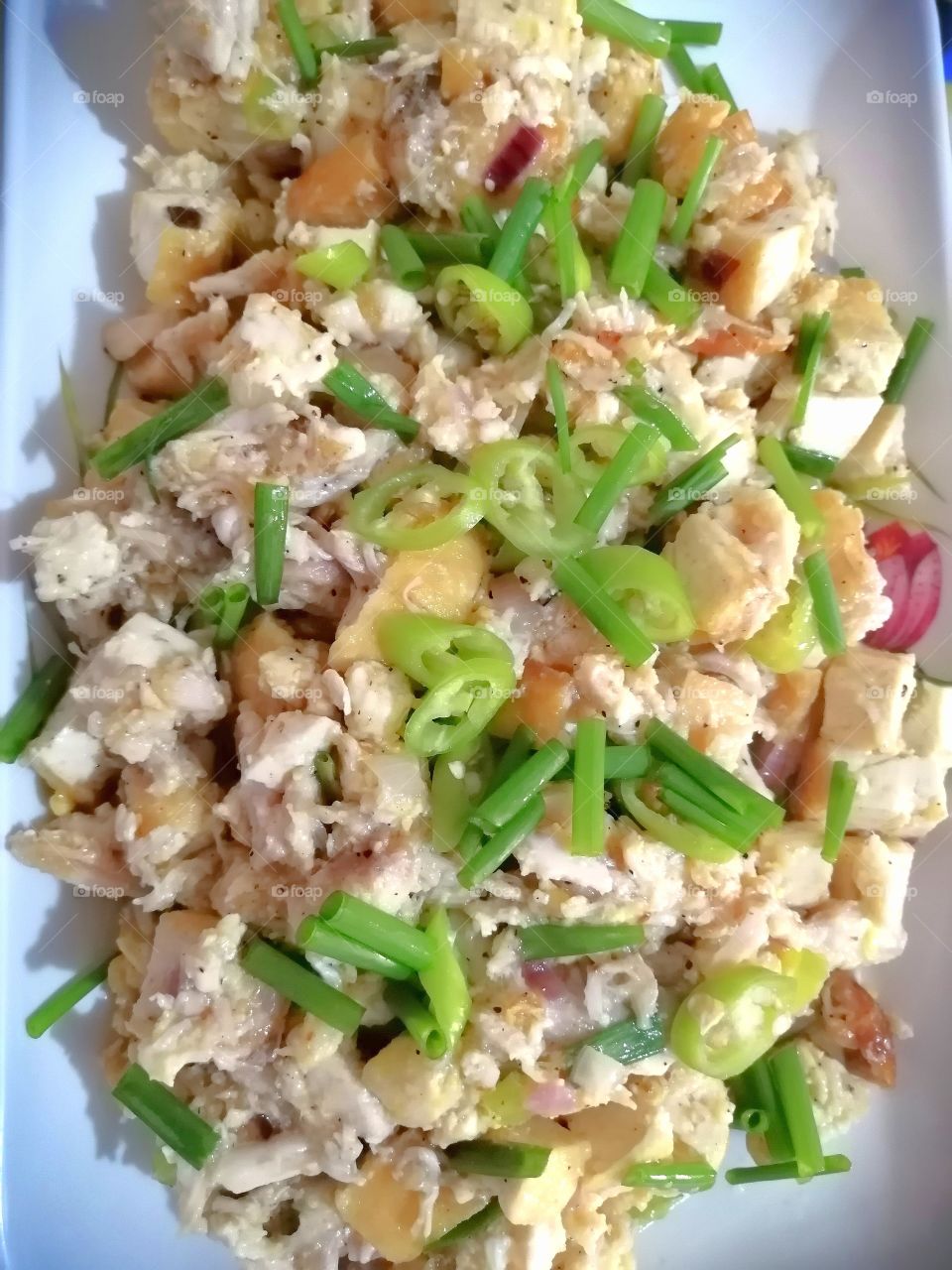 Chicken and Tokwa Sisig

A Filipino dish made from chicken meat and tofu, mayo, onions and chili.