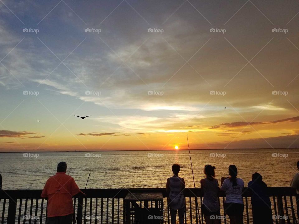 sunset fishing pier