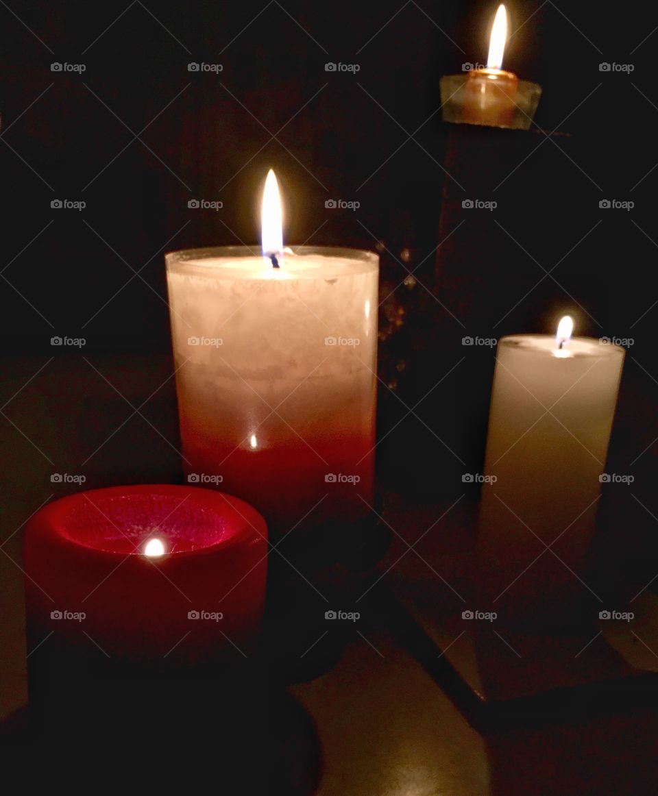 Four lit candles