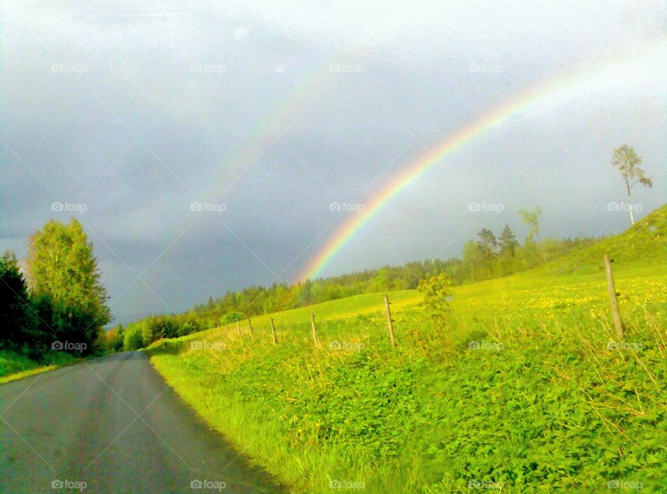 Dubble country-rainbow!. After rain comes sunshine and creates a beautiful view of the sky!